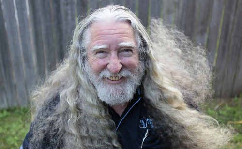 Chris Hales has shaved his trademark locks for charity. Chris Hales has shaved his trademark locks for charity.